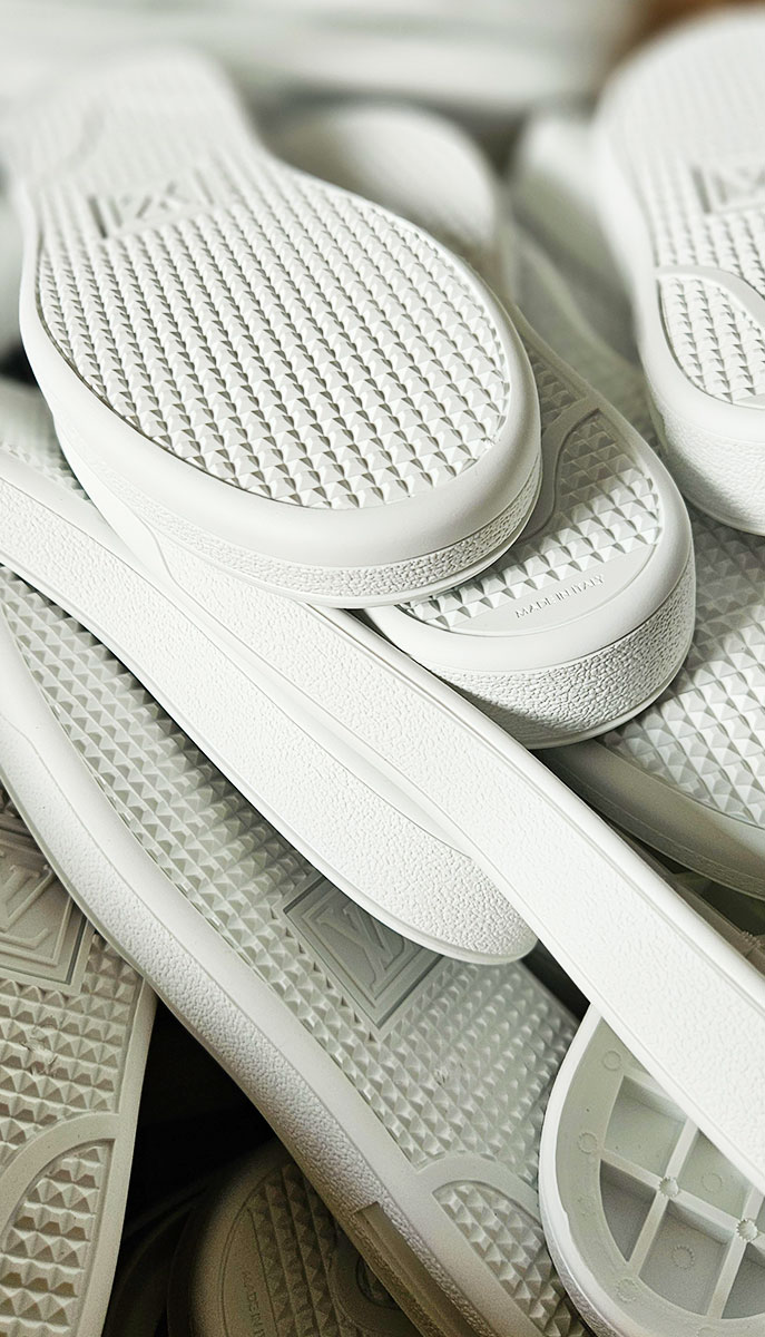 Stampa suole scarpe bianche